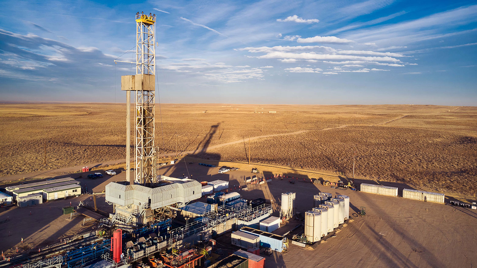 Tanks, cranes, and rig at Rockies Business Unit in Greeley, CO